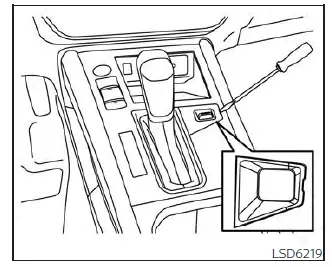 Nissan Kicks shift lock release location for CVT selector